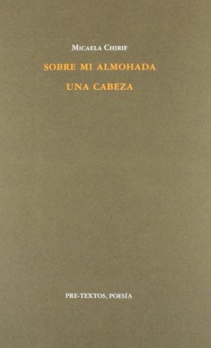 Sobre mi almohada una cabeza
