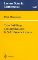 Twin buildings and applications to S-arithmetic groups