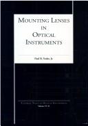 Mounting lenses in optical instruments