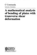 A mathematical analysis of bending of plates with transverse shear deformation