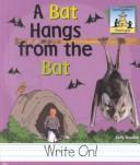 A bat hangs from the bat