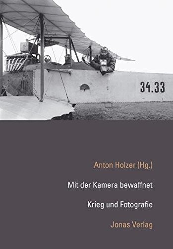 Mit der Kamera bewaffnet.